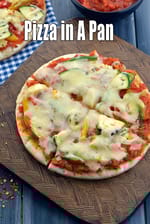 pizza in a pan recipe | pan pizza | no oven Indian pizza | homemade pan pizza | pan pizza without oven |