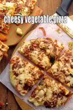 cheesy vegetable pizza recipe | veg cheesy pizza | Indian style cheese sauce veg pizza |  cheese veggie pizza on tava |