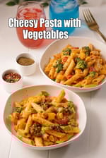 cheesy pasta with vegetables recipe | saucy penne pasta with vegetables | cheesy veggie pasta |