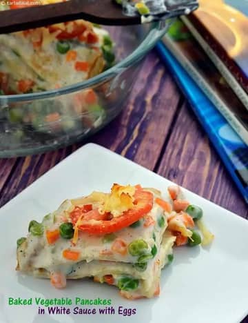 Baked Vegetable Pancakes In White Sauce With Eggs Recipe