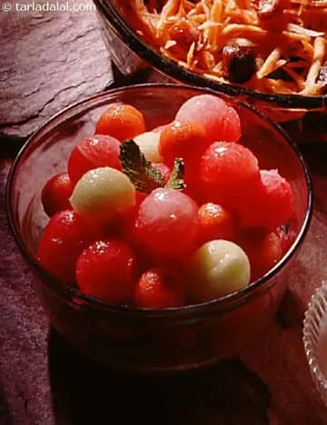 Melon And Papaya Balls In Honey And Ginger Dressing Recipe