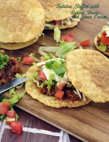 Tostadas Stuffed With Refried Beans And Sour Cream Recipe