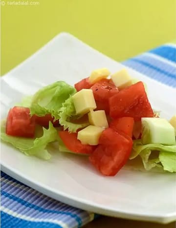 Tomato Cucumber And Lettuce Salad In A Lemon Dressing Recipe