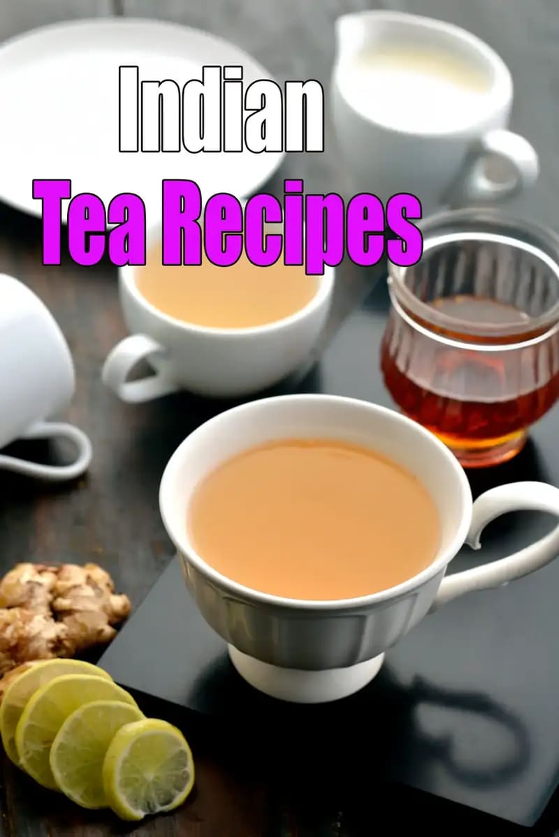 A cup of Indian chai on a table with ginger, lemon slices, and a glass of black tea