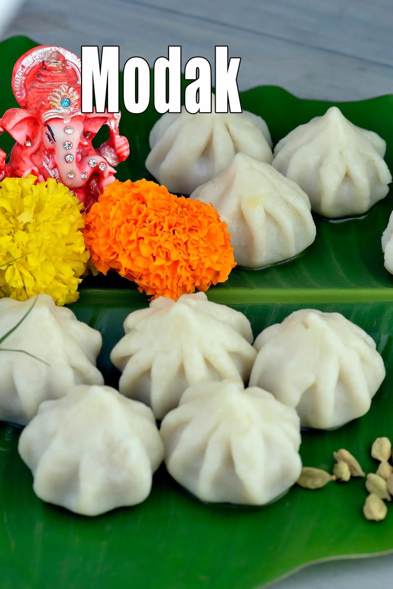 Modak recipe | steamed modak | Ukadiche Modak for Ganesh Chaturthi recipe | modak made with mould | modak handmade recipe | | Tarla Dalal