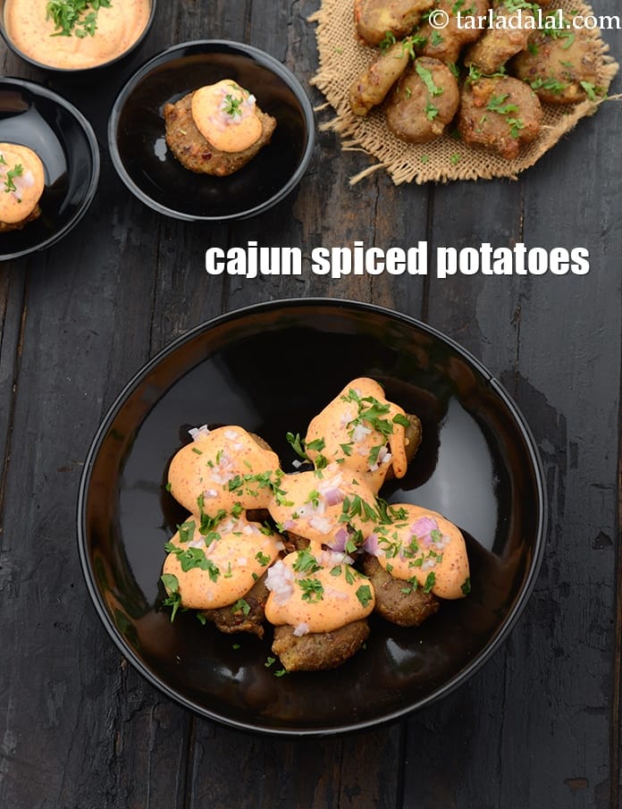 Cajun spiced potatoes recipe | Barbeque nation style Cajun potatoes | Indian creamy cajun potatoes | | Tarla Dalal