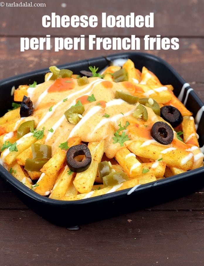 Cheese loaded peri peri French fries recipe | peri peri fries with cheese sauce | Indian cheese peri peri fries | | Tarla Dalal