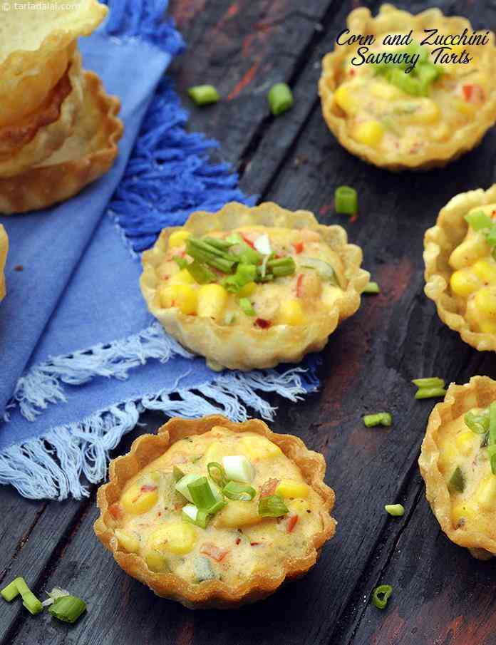Corn And Zucchini Savoury Tarts Recipe (Vegetarian Recipes) | Tarla Dalal