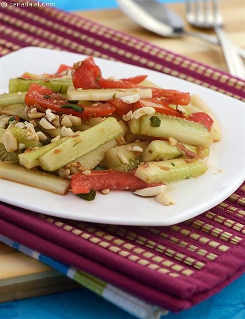 Cucumber, Tomato and Peanuts in Sweet and Sour Dressing recipe, Thai Recipes | Tarla Dalal