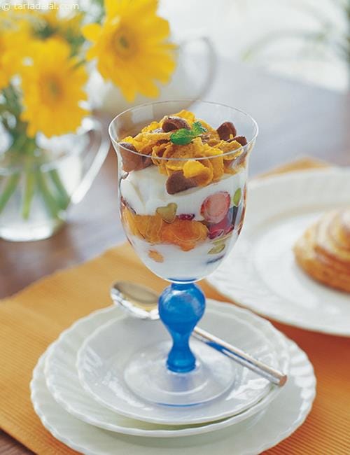 Fruity Yoghurt, Sweetened Yogurt with Mixed Fruits and Corn Flakes | Tarla Dalal