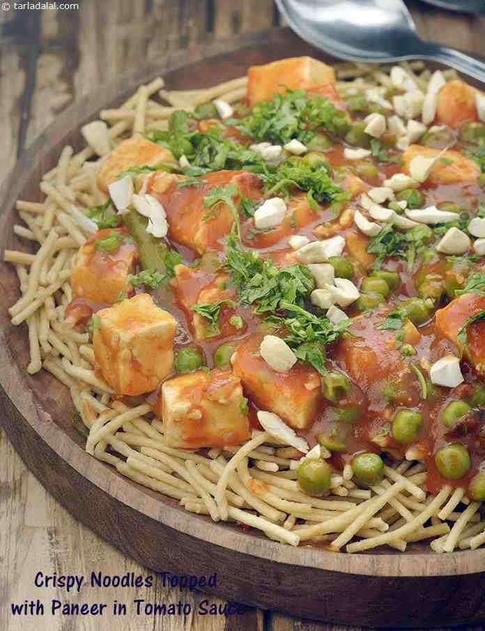 Crispy Noodles Topped with Paneer in Tomato Sauce recipe, Saatvik Recipes | Tarla Dalal