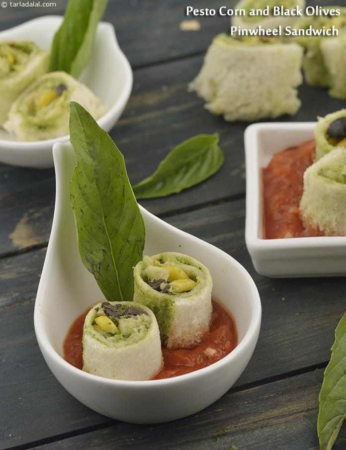 Pesto Corn and Black Olives Pinwheel Sandwich | Tarla Dalal