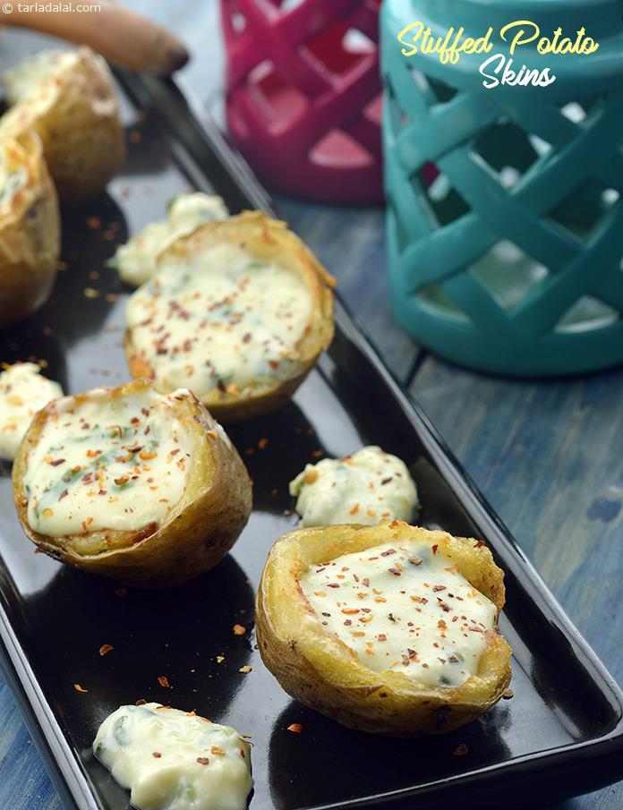 Stuffed Potato Skins, Stuffed Jacket Potatoes recipe, Mocktail Recipes | Snack Recipes | Tarla Dalal
