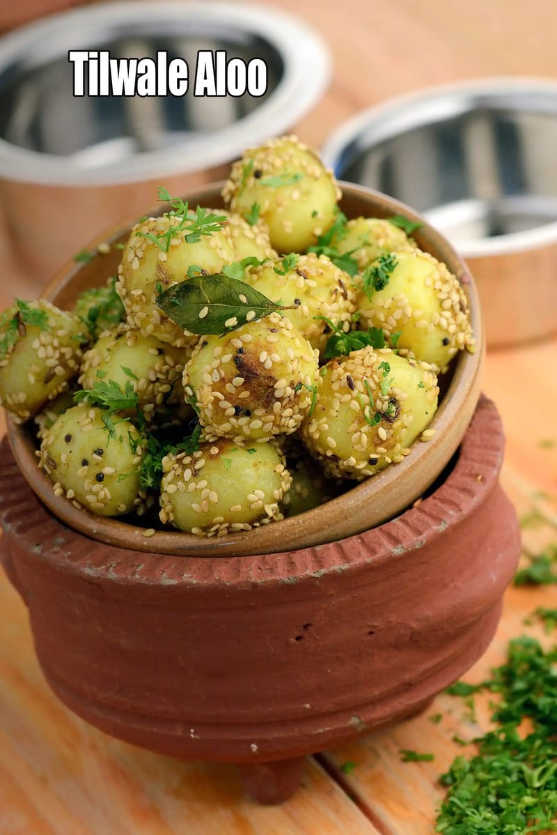 Tilwale Aloo recipe | Til Aloo Sabzi | Sesame Baby Potatoes | | Tarla Dalal