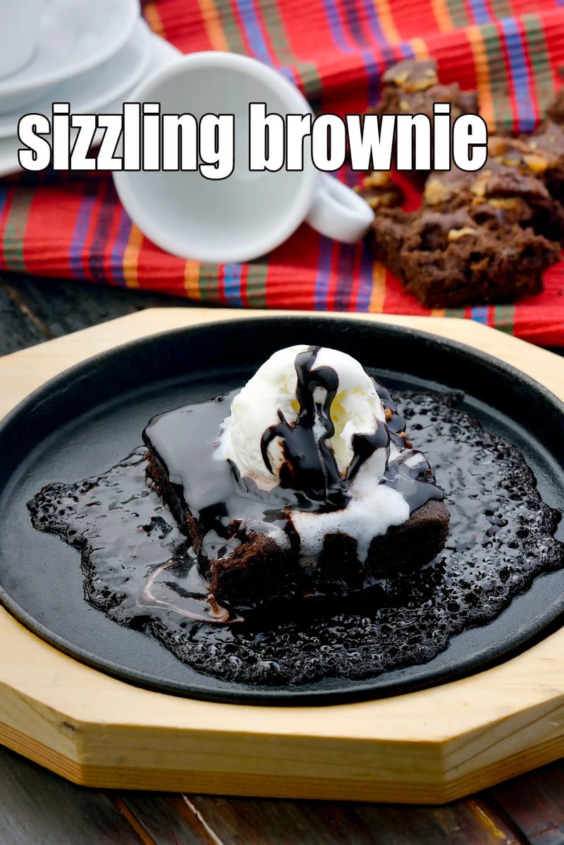 Sizzling brownie recipe | eggless sizzling brownie | sizzling brownie with vanilla ice-cream | | Tarla Dalal