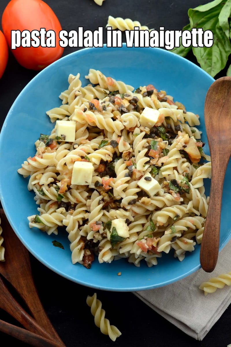 Pasta salad in vinaigrette recipe | Indian style tomato pasta salad in basil vinaigrette dressing | | Tarla Dalal