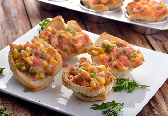  Baked Corn and Tomato Bread Cups