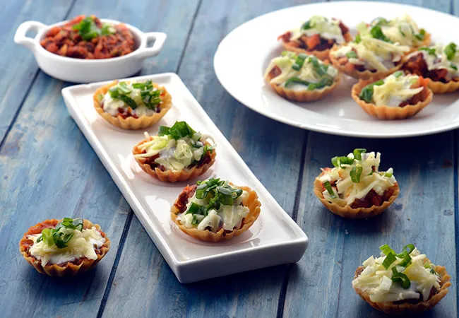  Mexican Tarts with Refried Beans and Sour Cream