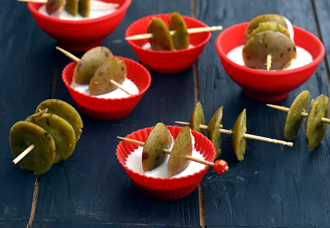 Mini Pesto Idlis with Olive Cream Cheese Dip