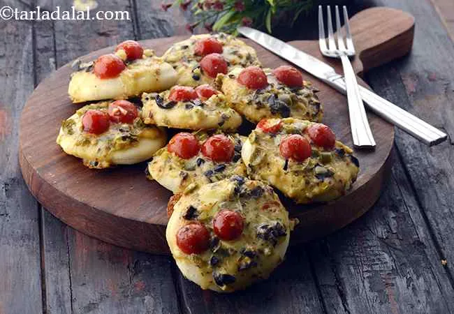 Mini Pizza Topped with Olive, Jalapeno and Cherry Tomato