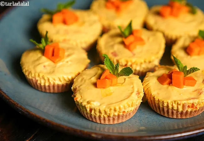 eggless mango cheesecake cups recipe | no bake mini mango cheesecake | mango cheesecake cups |