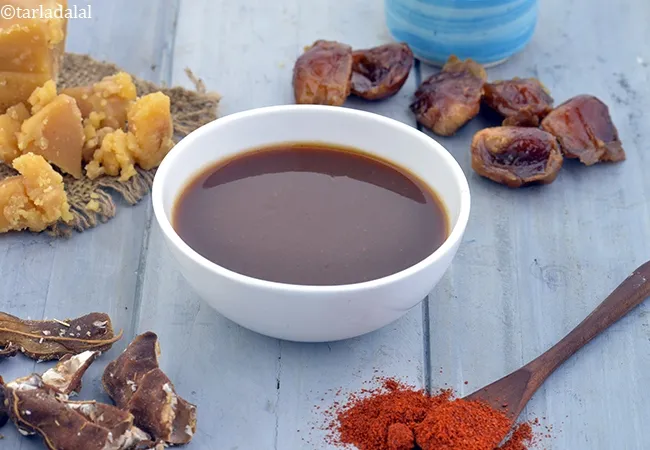 khajur imli chutney recipe | date tamarind chutney | meetha chutney for chaats | sweet tamarind chutney |