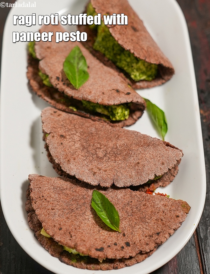 ragi roti stuffed with paneer pesto | paneer pesto nachni wrap | healthy red millet cottage cheese pesto wrap | pesto paneer wrap |